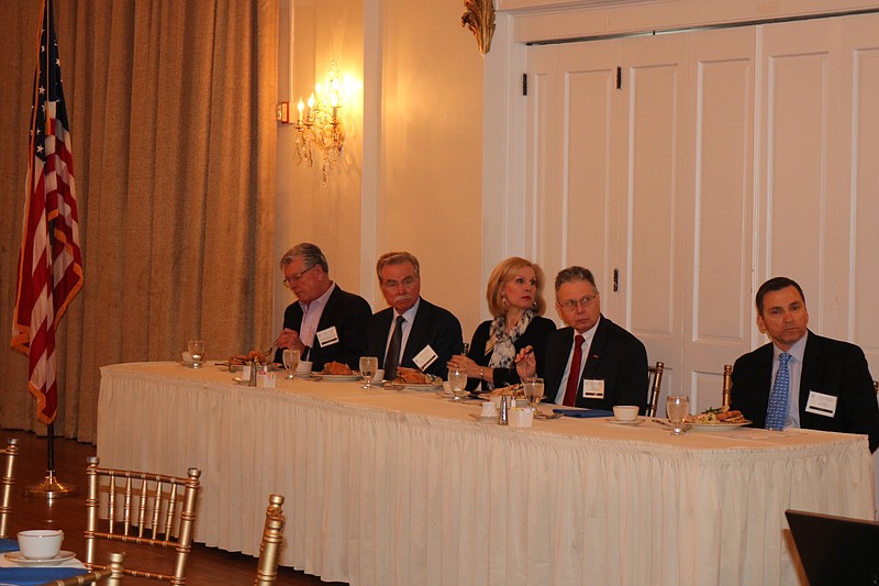 Members of the Chamber of Commerce look on as Gregory Matuson begins his presentation. 