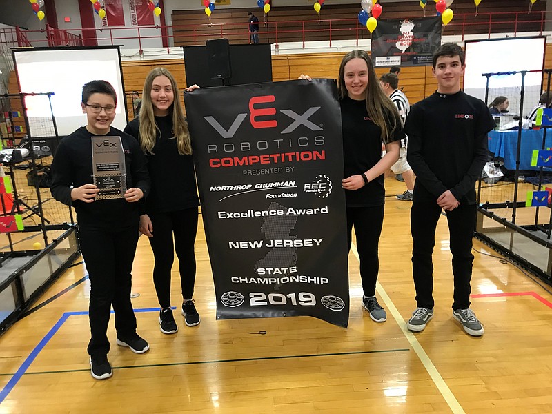 Team Linbots from left, Alex Savov and his sister, Emma, Farley O'Brien and Nate Fontana all share a moment after their state win. (Courtesy the O'Briens) 