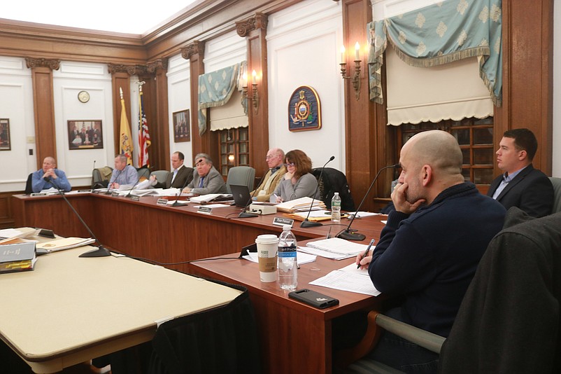 Zoning Board members listen to the applicants.