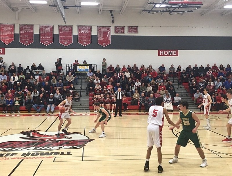 Joey Sacco searches for an open teammate during the nail-biting fourth quarter.