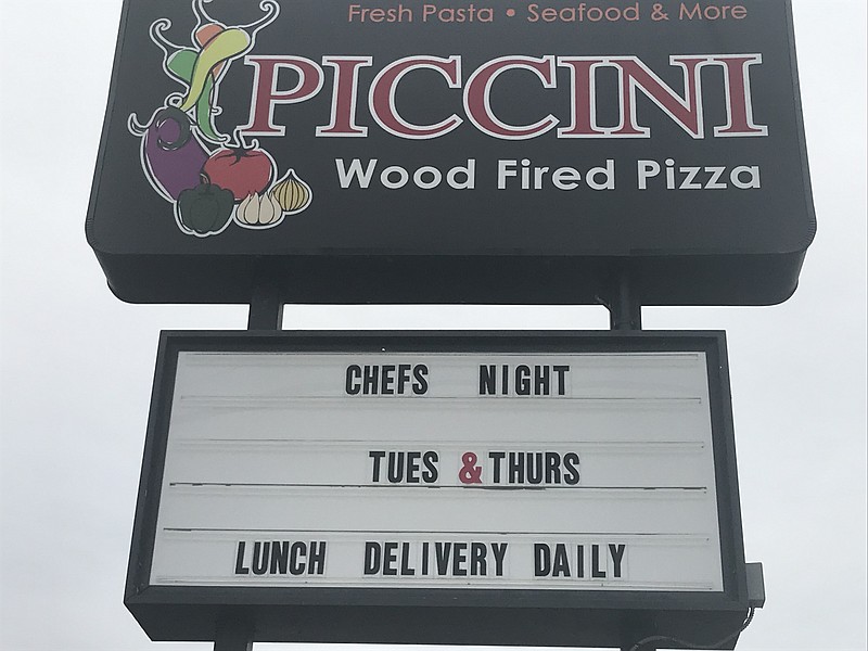 Piccini’s marquee announces its new service: lunchtime deliveries, seven days a week.