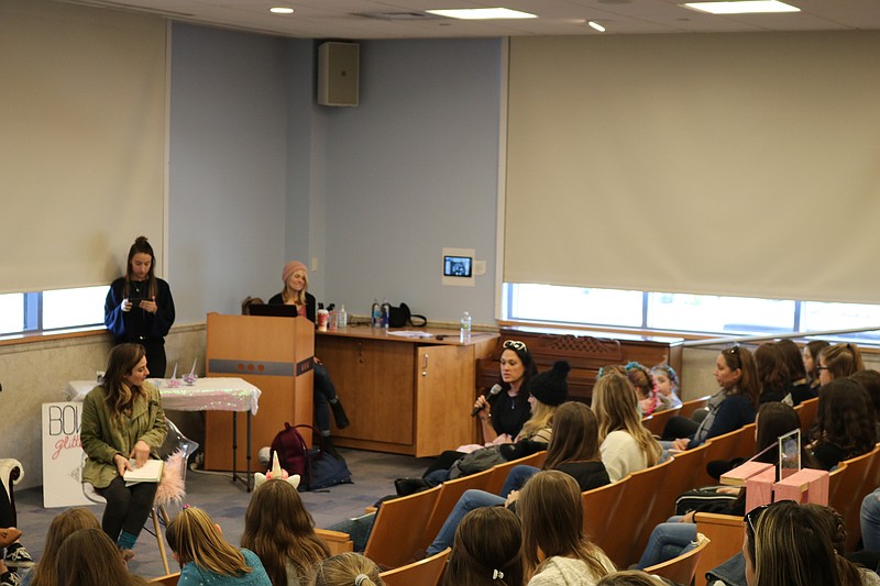 Members of the audience and the panelists exchange ideas during a question-and-answer format.