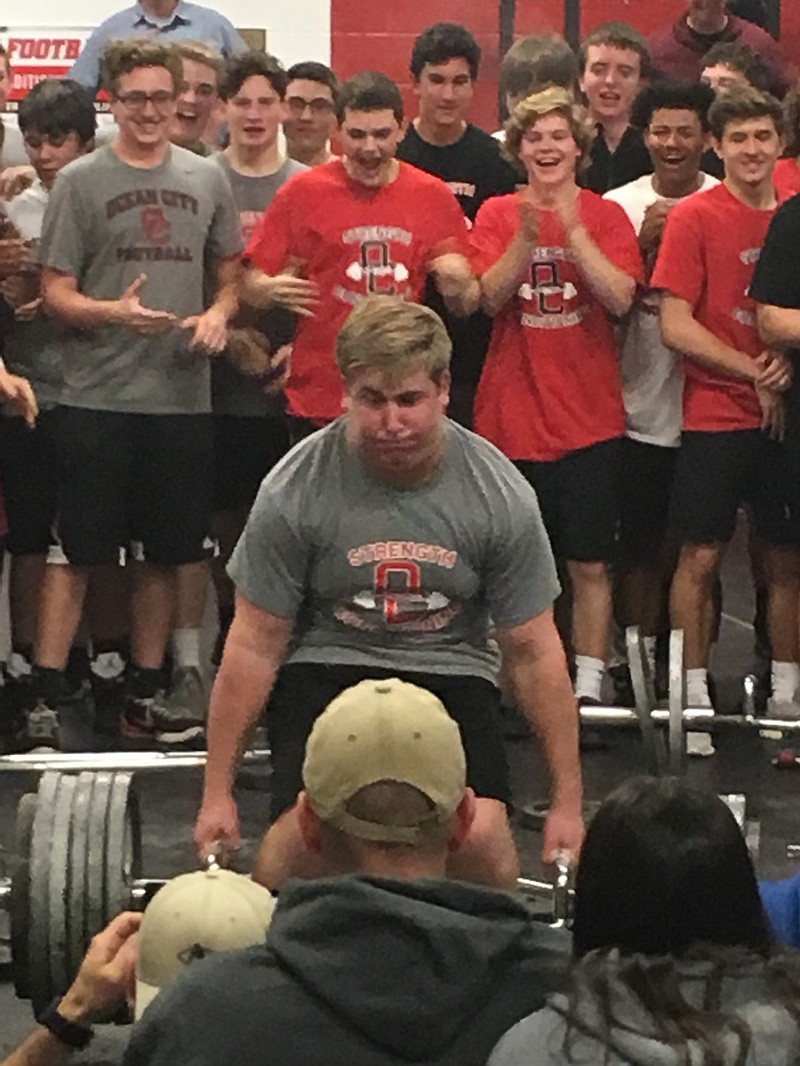 Chris Armstrong shows his strength while starting the record-setting lift.