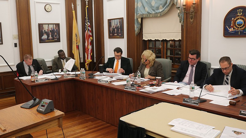 Members of City Council study details of the proposed 2019 municipal budget during their meeting.