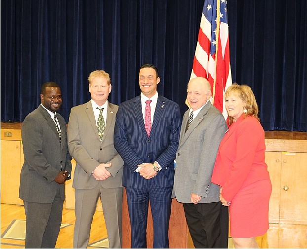 Antwan McClellan, Erik Simonsen, Mike Testa, Gerald Thornton and E. Marie Hayes posed for a quick picture after the voting totals were announced. 