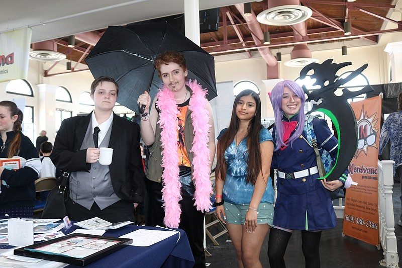 From left, Ocean City High School students Lex Larcher, Zeph Zensen, Gabrielle Gibbs and Aria Lindberg ham it up at the show.