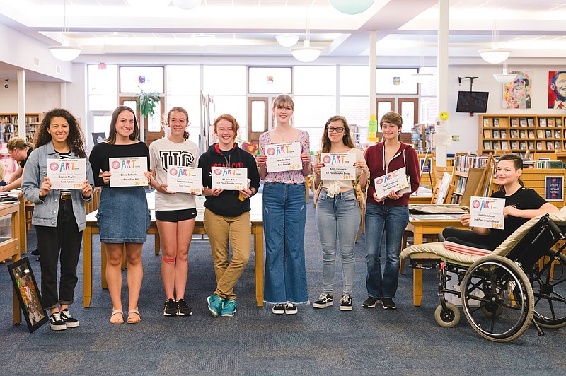 Ocean City High School students show their certificates for winning an art show. (Photo courtesy JASM Consulting)