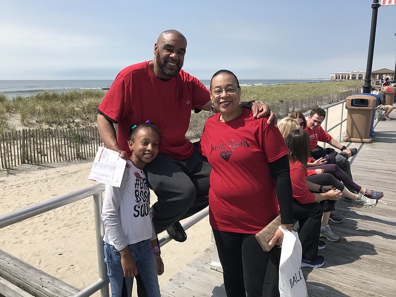 The Jean’s Gems team may have been small, but they were just as enthusiastic as the larger groups.  Pictured are Glenn White and Monique Younger and 8 year old Nevaeh Younger.  They were walking in memory of Jean White, a heart disease victim who died in 2000. 