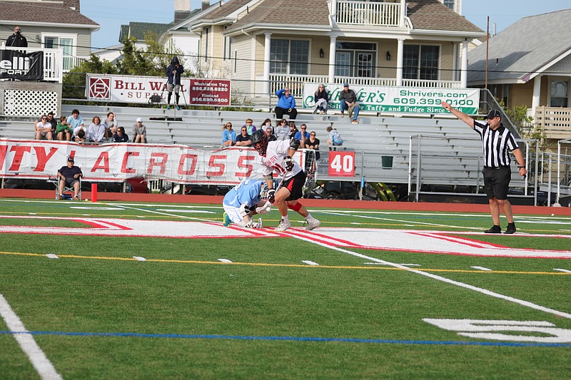 Ocean City's Billy Kroeger on the face-off.