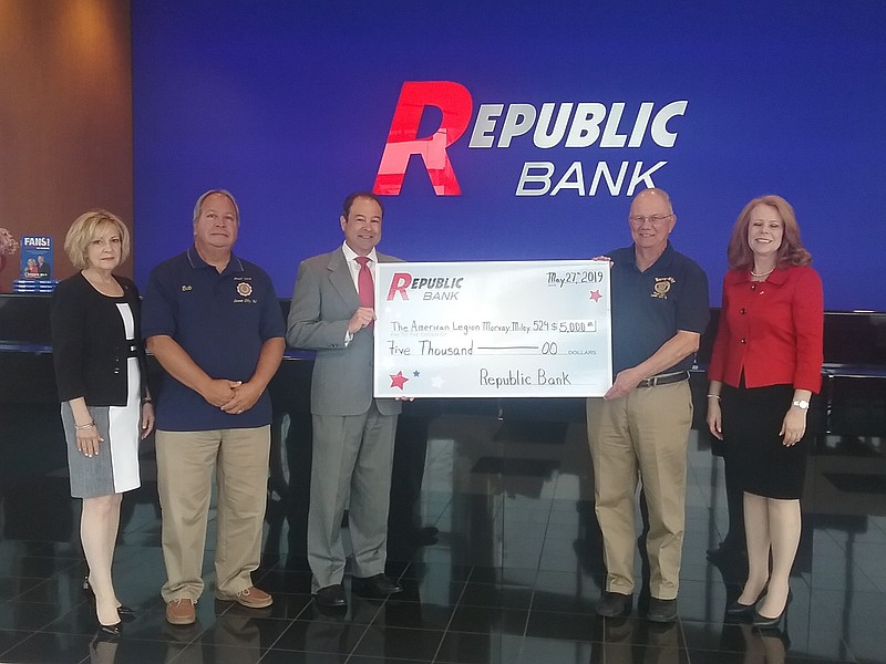 Republic Bank representatives present a $5,000 check to the American Legion. From left, Leslie Piluigi, Republic Bank regional marketing manager, Bob Marzulli, Commander  American Legion Post 524, John Davidson, Republic Bank Somers Point manager, Jim Sambucci, Trustee American Legion Post 524, and Sharon Hammel, Republic Bank retail marketing manager. (Photo Courtesy Doug Otto)