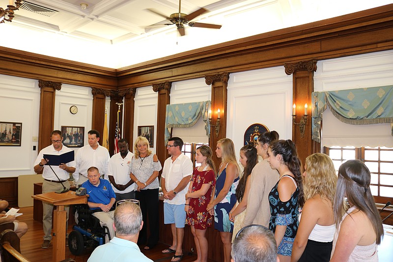 Members of the Ocean City High School girls JV8+ crew team are honored by City Council for their national championship.