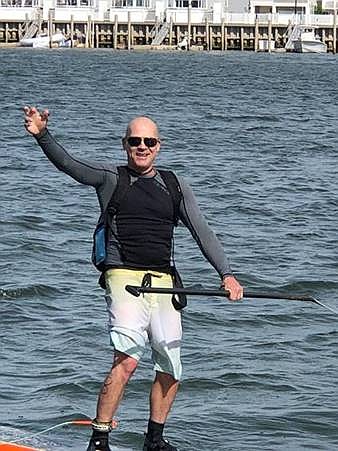 Dean Randazzo gives a triumphant wave. (Photo courtesy Dean Randazzo Cancer Foundation)