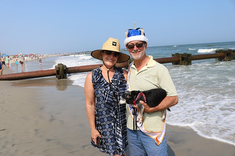 Mr. Mature America 2019 Jack Merritt, of West Grove, Pa., with his wife, Julia Altman, and their dog, Watson. 