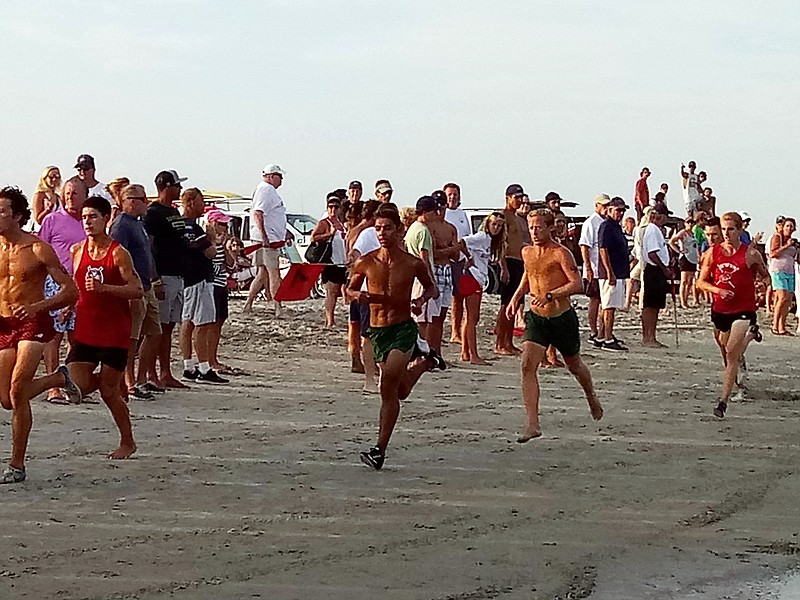 Ocean City lifeguard Artur Menezes competes in the one mile race.