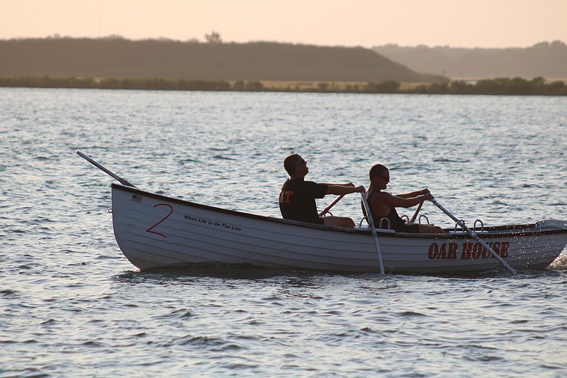 Ocean City's crew of brothers Dan and Matt Garbutt cruise to the finish line.