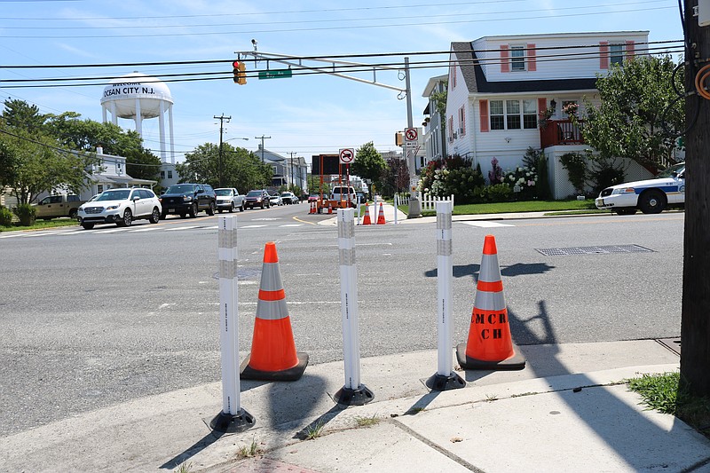 Safety cones and barriers now block the pedestrian crosswalk where Thomas F. Gibbons Jr. and his wife, Stephanie, were struck at the intersection of Eighth Street and Bay Avenue.