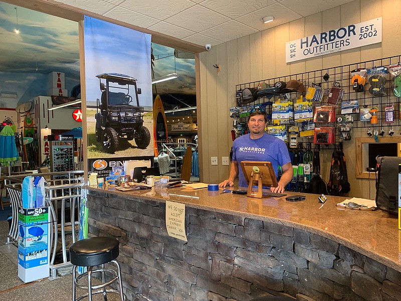 Chuck Piola at the counter of the Ocean View store located at 3024 U.S. Highway 9.