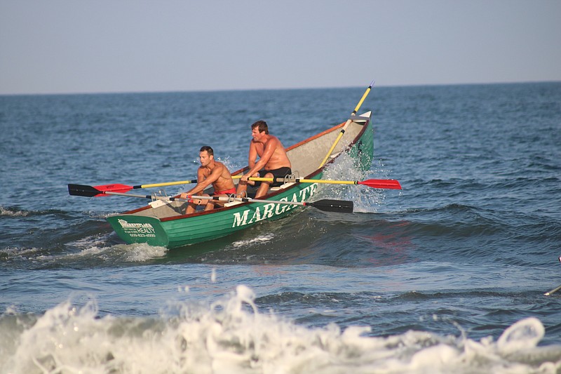 Chuck Gowdy and Chris Graves of Margate finish first in the doubles row.