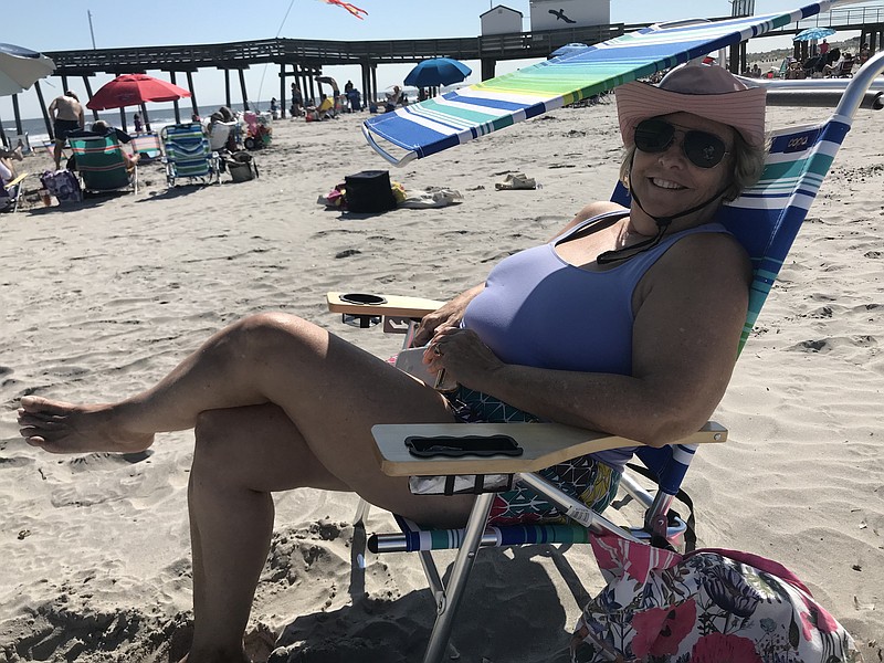 Beachgoer Jennifer Dagrossa enjoys having room to spread out and relax on the Ocean City beach.