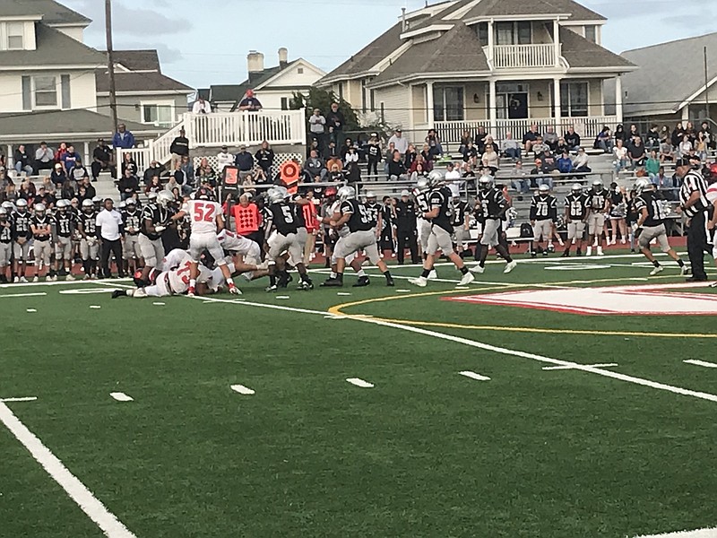 Ocean City's dominating defense swarms the ball.