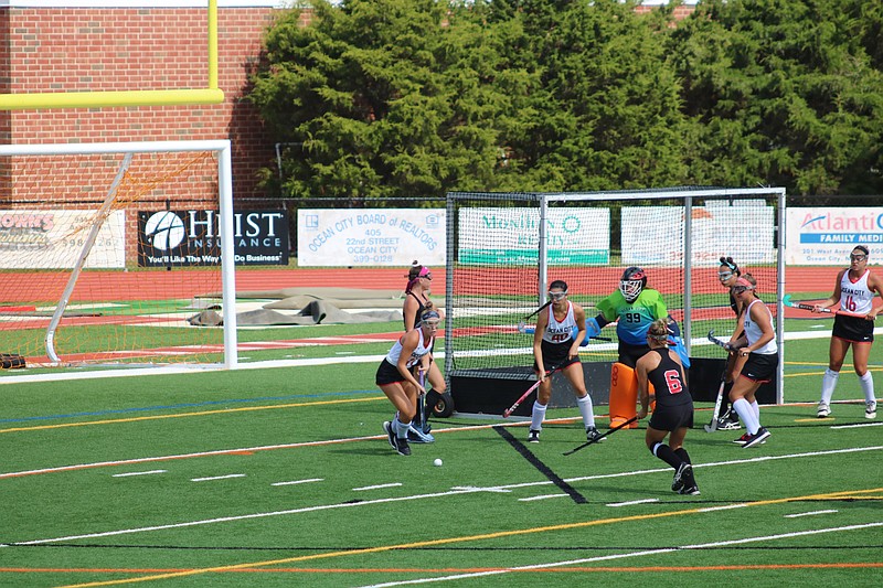 Ocean City's defensive unit works together to prevent West Essex from scoring.