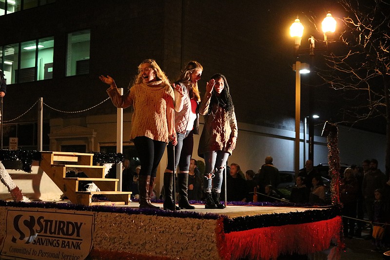 Katie Bowman, Tara McNally and Nya Gilchrist on the OCHS Miss Pumpkin Float.