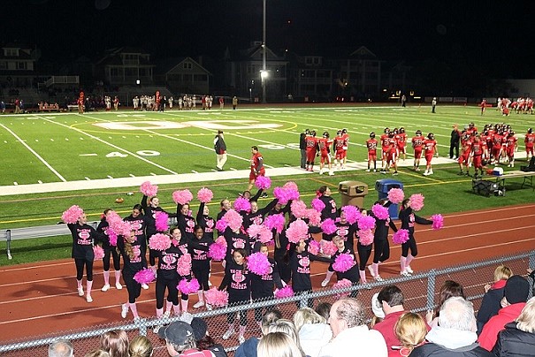 Ocean City's cheerleaders pump up the crowd.