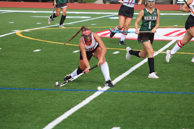 Ocean City's Sophia Run powers the ball through the midfield.