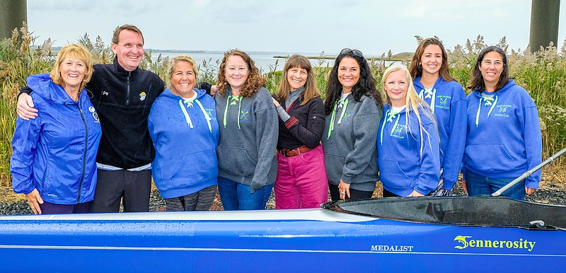 Cape May County Freeholder E. Marie Hayes, Ocean City Mayor Jay Gillian and members of the UBRC are all smiles with the new boat, “Jennerosity.”