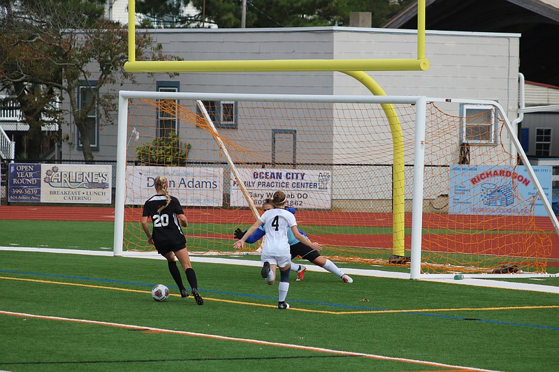 Summer Reimet (20) strikes one at the Timber Creek Goalkeeper.