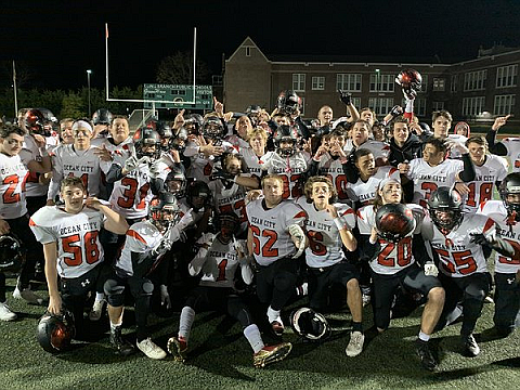 The Red Raiders celebrate after their semi-final playoff win at Long Branch.