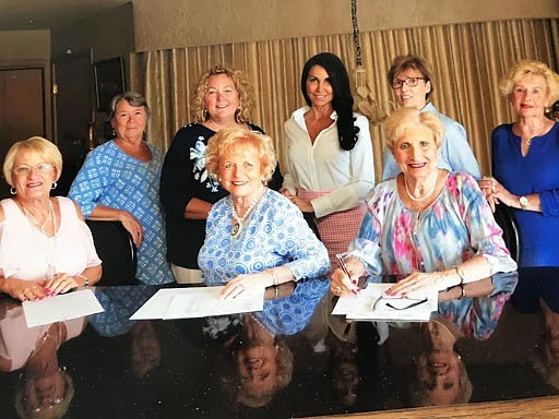 Miss Night in Venice Committee members, from left, seated, Sue Doll, Pat Gillian and Cathy Finnegan; and, standing, Susan Cox, Kathy Lavin, Colette Gabriel, Nancy Ely and May Ann Jones pose for a picture. Missing from the picture are Maribeth Neall and Sharon Capizzi.