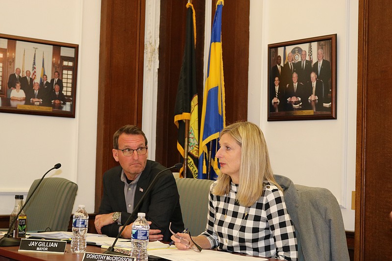 City Solicitor Dorothy McCrosson, seated next to Mayor Jay Gillian, tells Council of potential plans to use the former American Legion hall site for affordable housing.