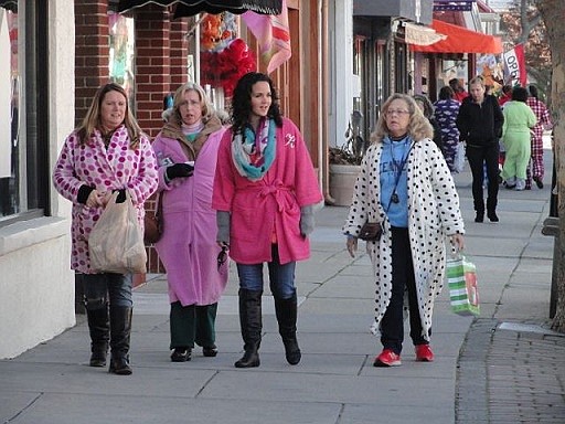 A popular part of the Earlier Than the Bird shopping extravaganza is to dress in pajamas.