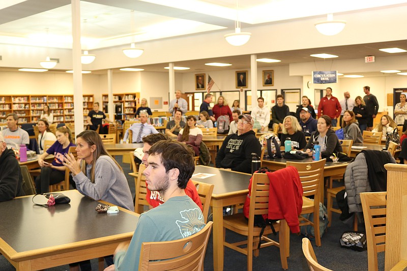 People fill the Ocean City High School library to support the student-athletes.