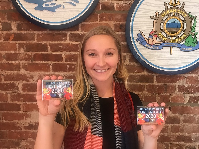 Families looking for a fun-for-all-ages New Year's Eve can purchase First Night 2020 buttons, such as these displayed by Ocean City employee Samantha Dowling.  (Photos courtesy City of Ocean City)