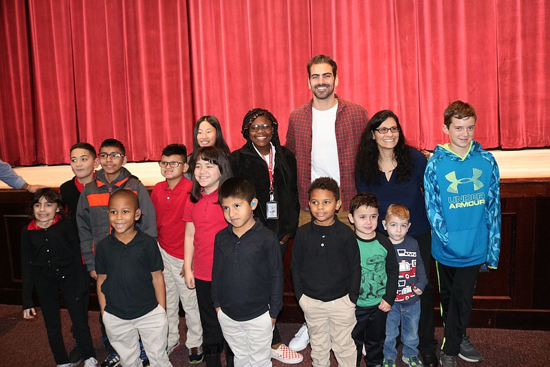 Nyle DiMarco with deaf children and their families from school districts throughout New Jersey. 