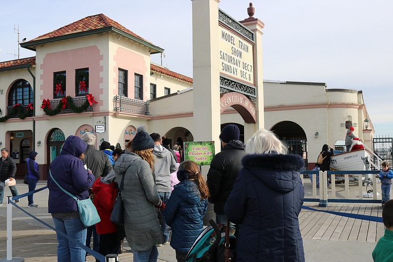 The beachfront photos with Santa is a popular attraction year after year.