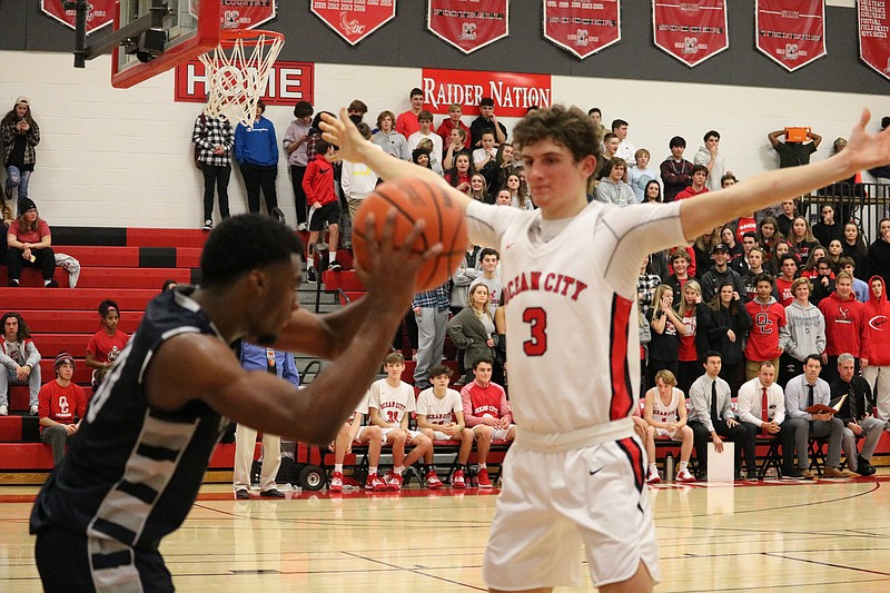 Red Raider Tom Finnegan guards the inbound pass.