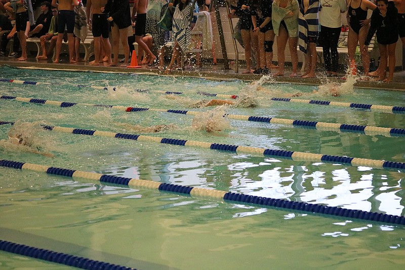 A tight race at the start of the boys 100 yard freestyle.