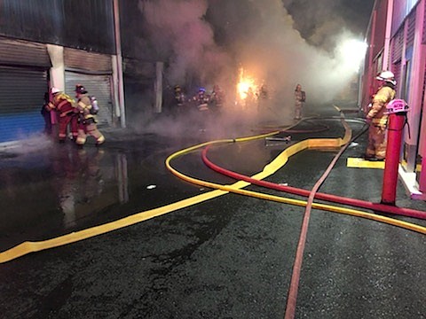 About 75 firefighters work together to get the fire under control.