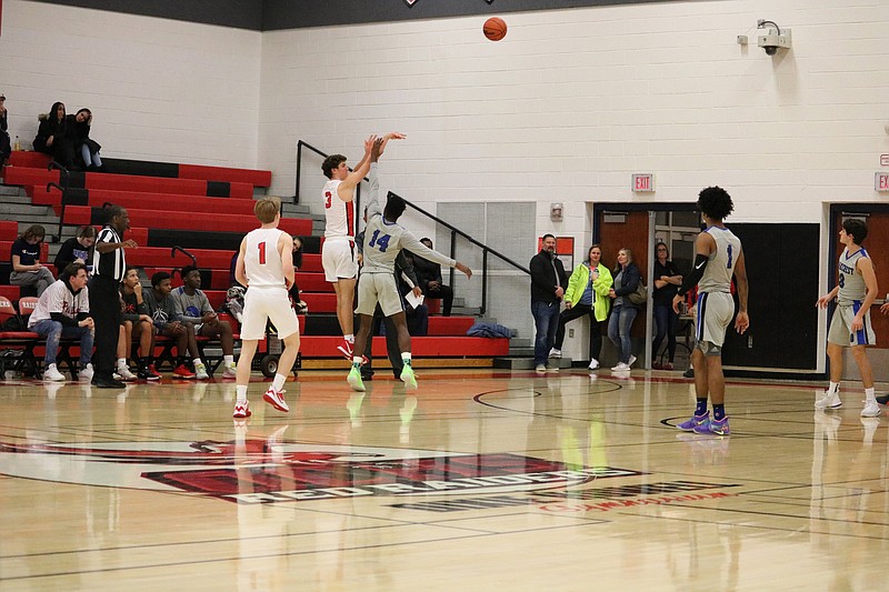 Tom Finnegan drains one of his four 3 pointers on the evening.