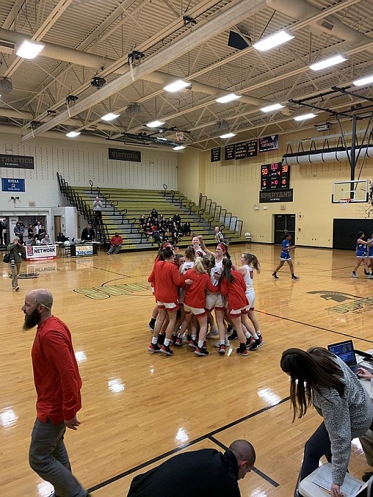 The Red Raiders erupt in a post-game victory celebration.