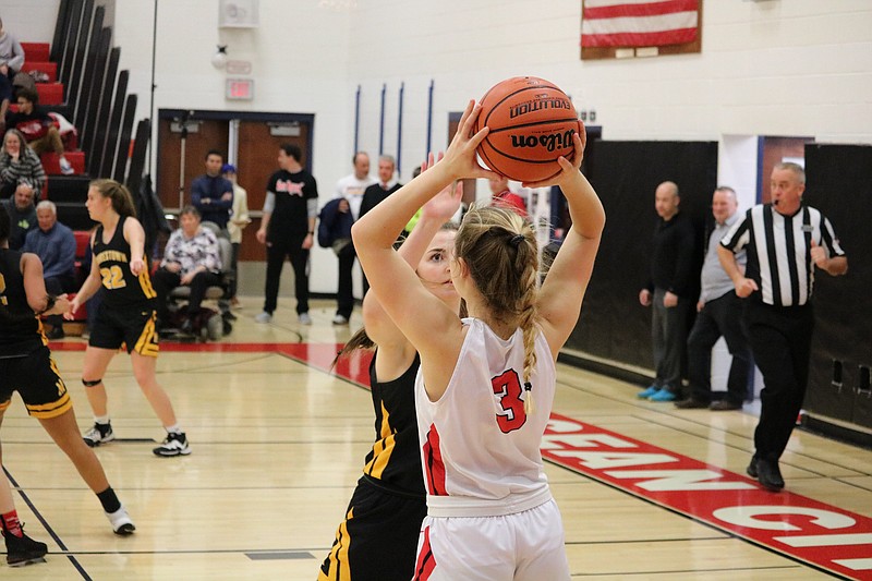 Marin Panico looking for the long pass with Moorestown heavy pressure.