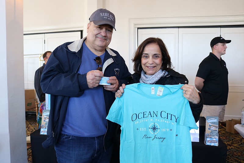 Rocco and Cheryl Biancaniello, of Hainesport, N.J., display some of their purchases at Market Madness.