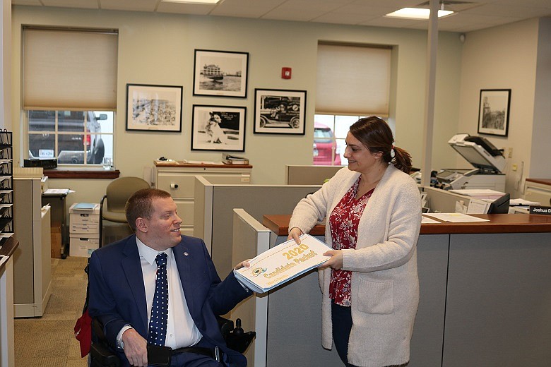 Councilman Bob Barr submits his nominating petitions to City Clerk Melissa Rasner.