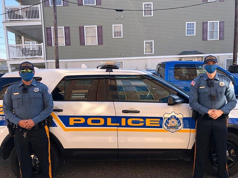 Officers Jonathan Simonson, left, and Neal Cullen are among the members of the police department now wearing masks during the coronavirus pandemic. (Photo courtesy of Ocean City Police Department)