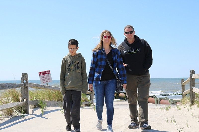 Kristin Zielinski and Dustin Valway with his stepson, Christopher Valway, of Pennsylvania, decided to come down to check out the beach and spend a beautiful Mother's Day. 