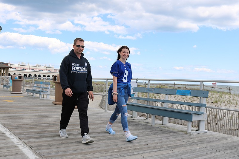 Father-daughter duo, Tom Murphy and Skylar, 19, both of Collings Lakes, take a brisk stroll in the fresh ocean air.