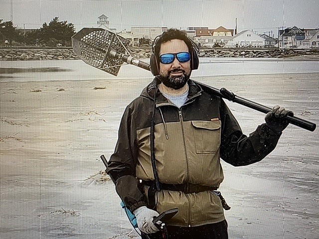 John Favano of Ring Finders with the tools of the trade on a local beach.